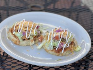 $14.99 Sopes de Tinga served with 2 Mexican style chicken